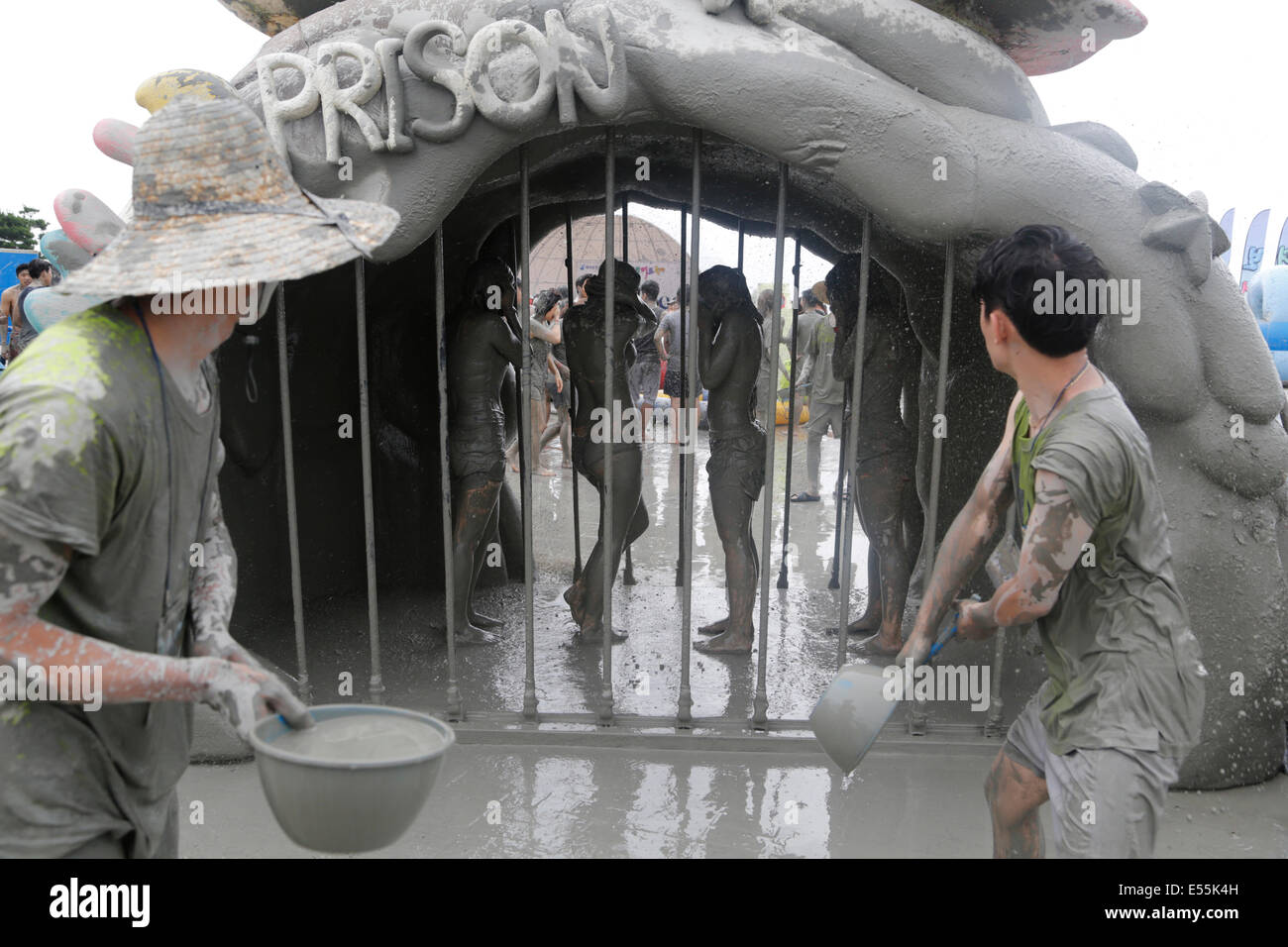 People play in the mud during the Boryeong Mud Festival, Jul 18, 2014 : People play in the mud during the Boryeong Mud Festival at Daecheon beach in Boryeong, about 190 km (118 miles) southwest of Seoul, South Korea. The festival organisers said that about 2 to 3 million tourists visit the annual mud festival. © Lee Jae-Won/AFLO/Alamy Live News Stock Photo