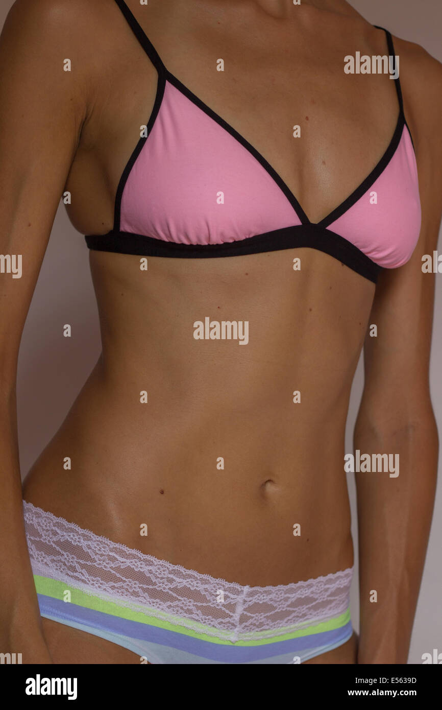 woman female body slim diet perfect torso lingerie bra panties tan tanned  Stock Photo - Alamy