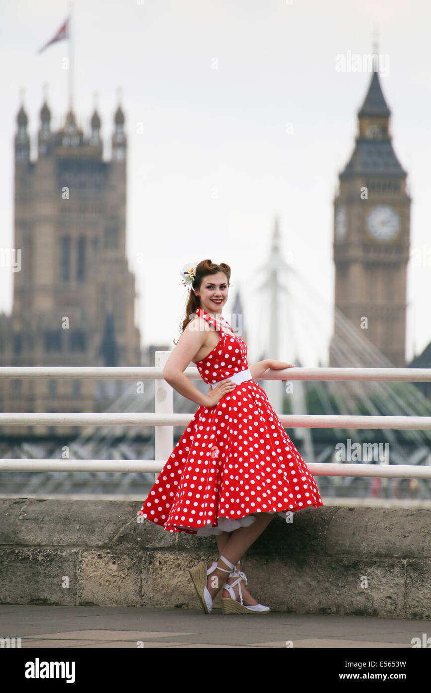 Woman in bright red polka dot dress on the embankment in front of Big Ben  Stock Photo - Alamy