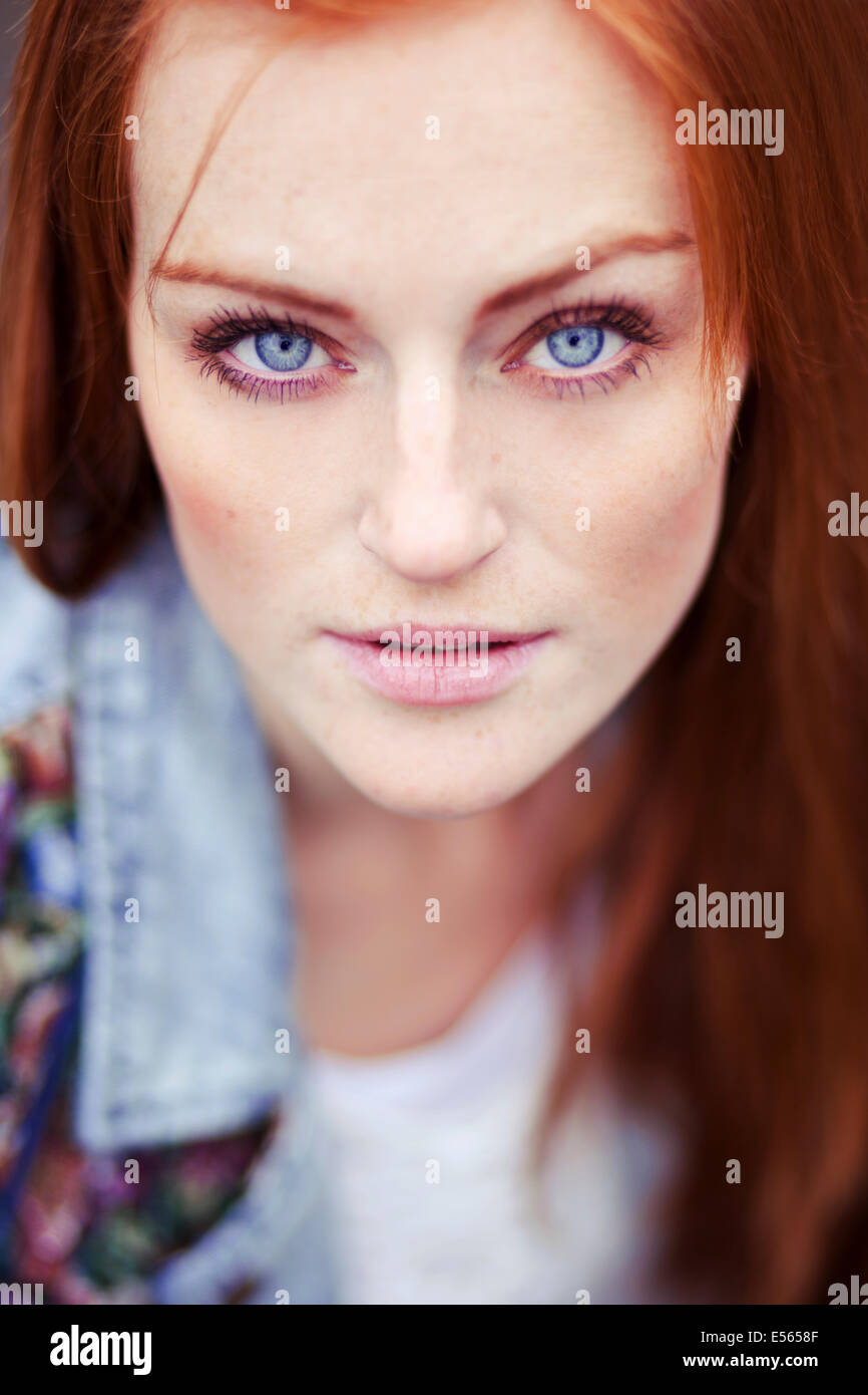 Portrait of young woman looking at camera Stock Photo