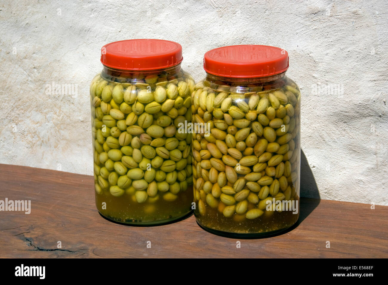 Home made olive curing. Cut olives are placed in a jar with brine Stock