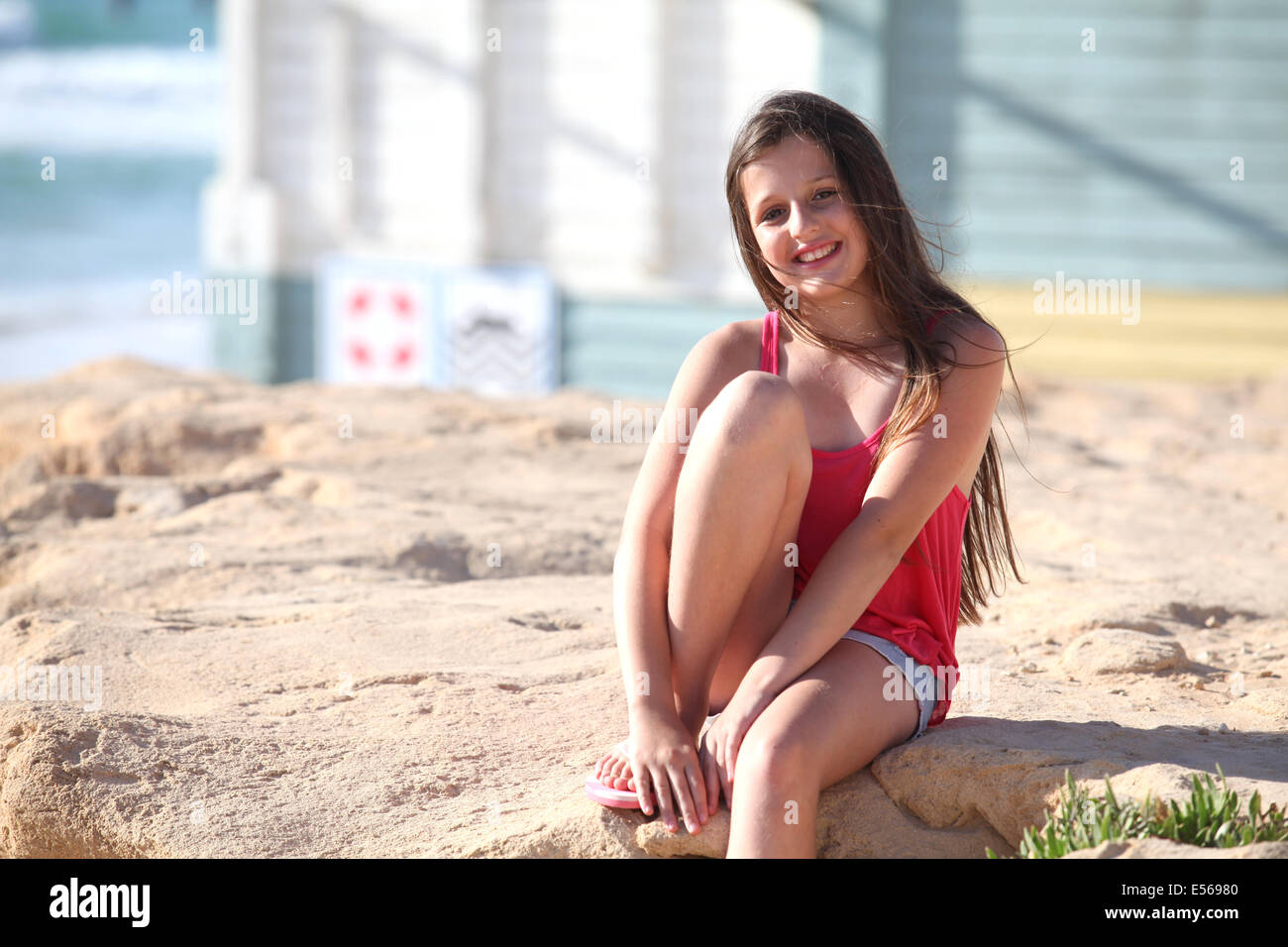smiling young girl of 12 on the beach Model Release Available Stock Photo