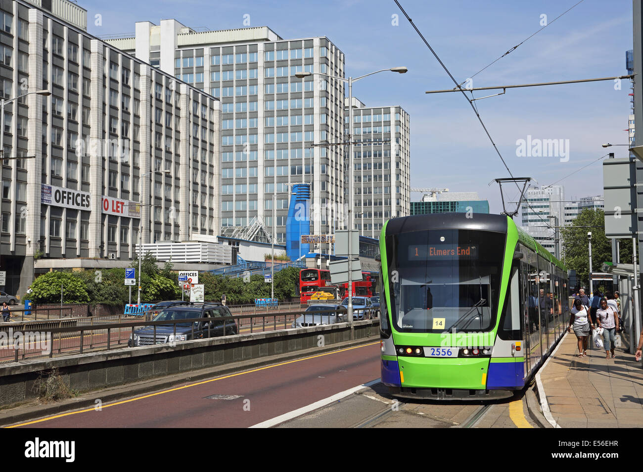 A Tram on the Croydon Tramlink system stops on Wellesley Road in Croydon town centre Stock Photo