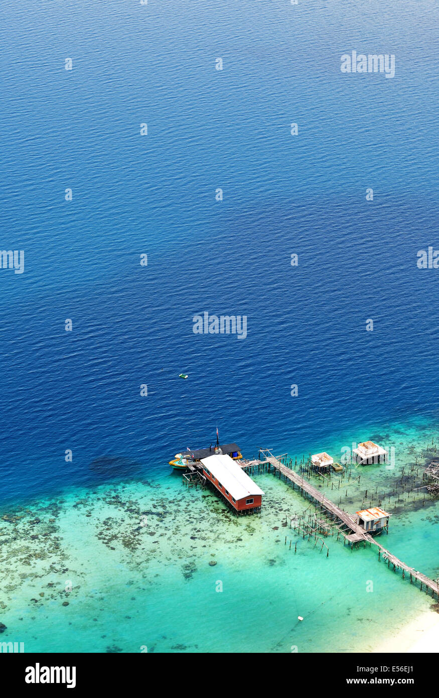 Scenic aerial view of an ocean with jetty and coral, Tun Sakaran Dandai Marine park, Sabah Borneo Stock Photo