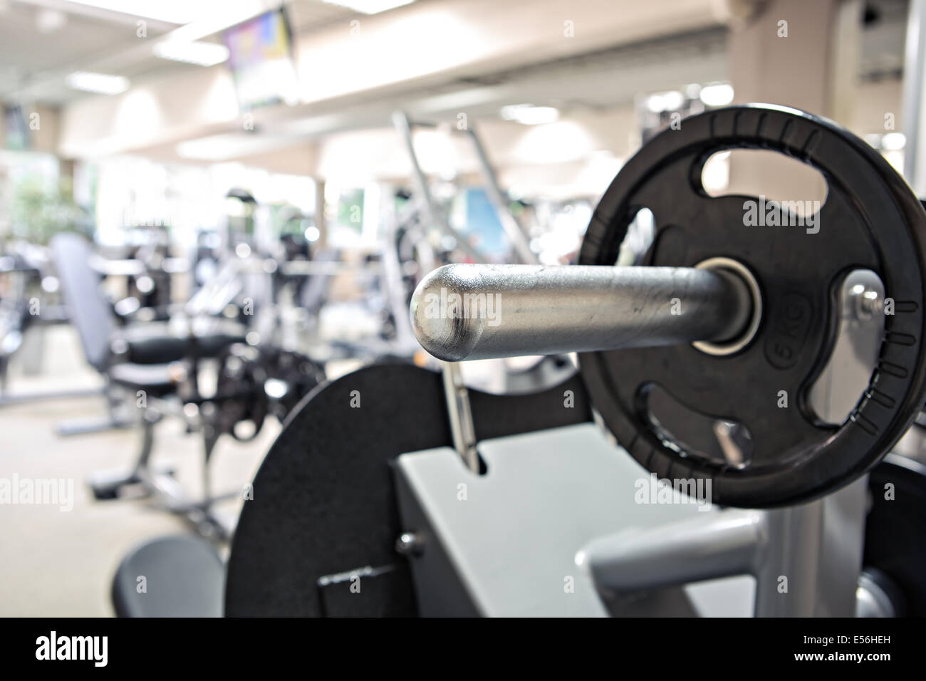 diverse equipment and machines at the gym room Stock Photo