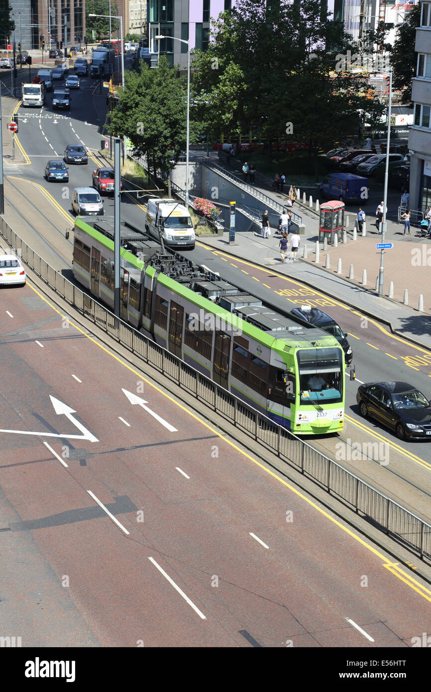 A Tram on the Croydon Tramlink system travels south on Wellesley Road in Croydon town centre Stock Photo