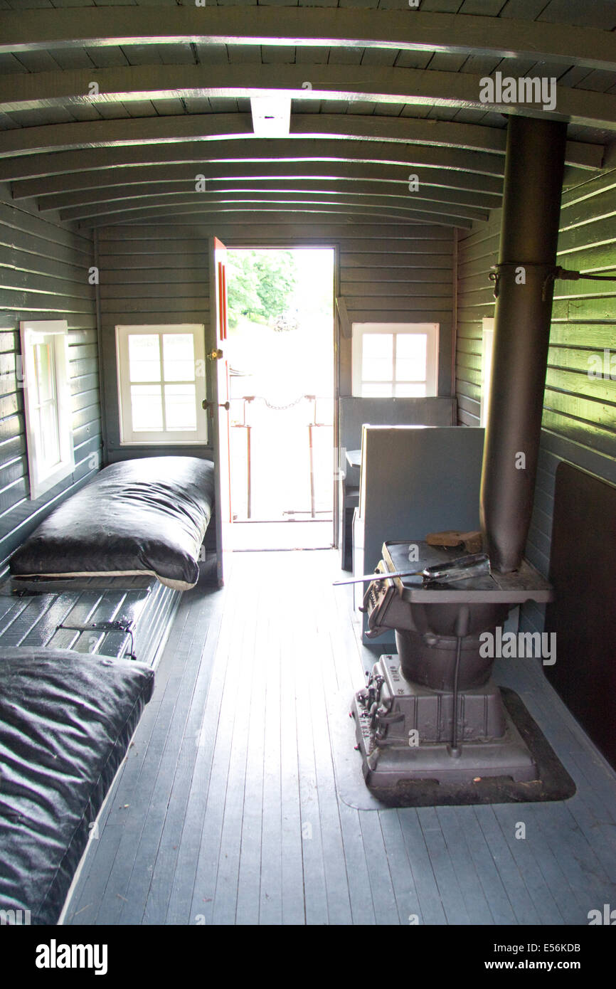 Interior of railway carriage showing worker's Cass, West