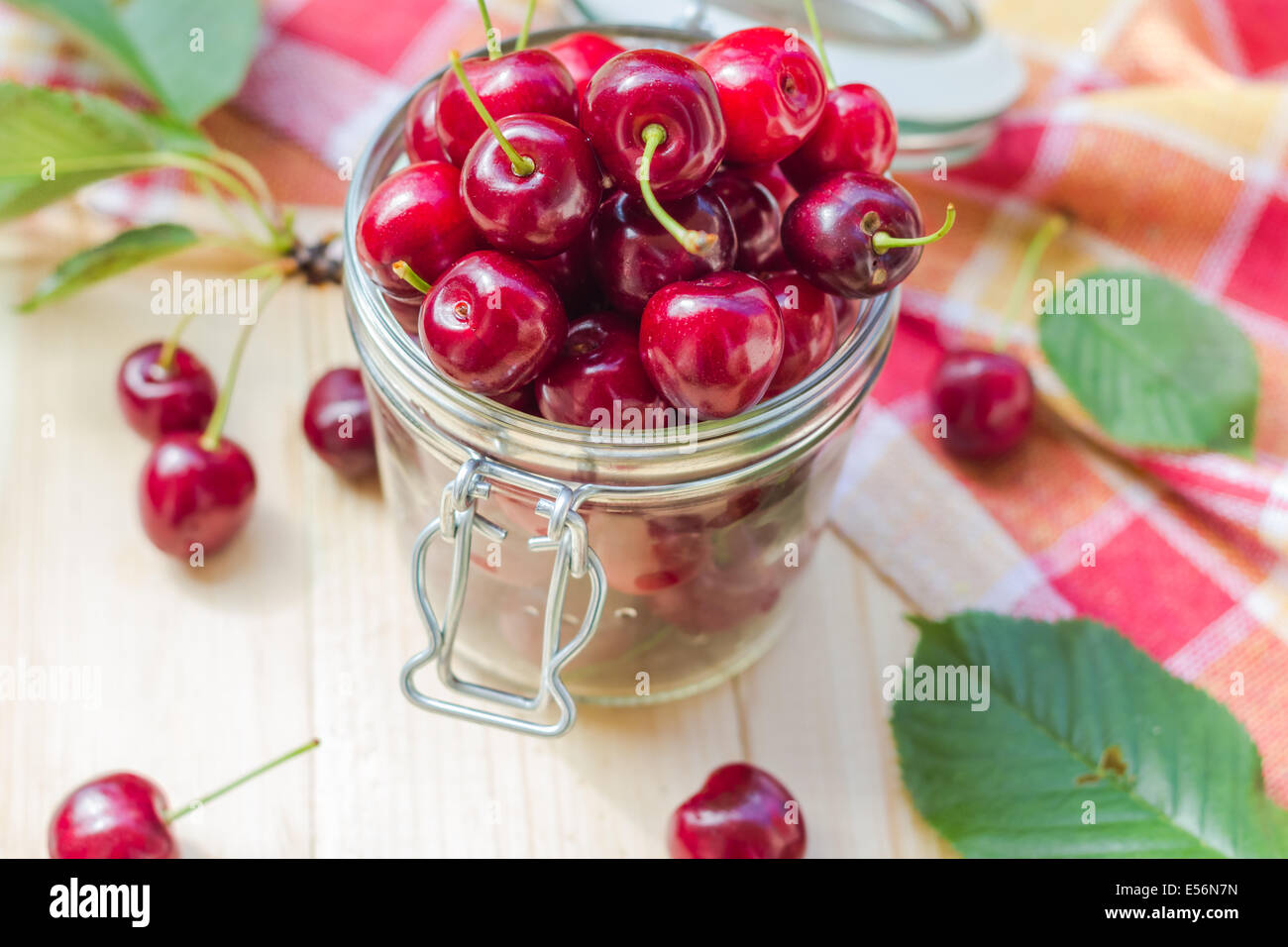 Summer fruits closeup of cherries in a jar for processed Stock Photo