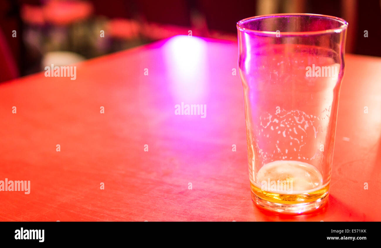 Almost Empty Pint Glass. Stock Photo