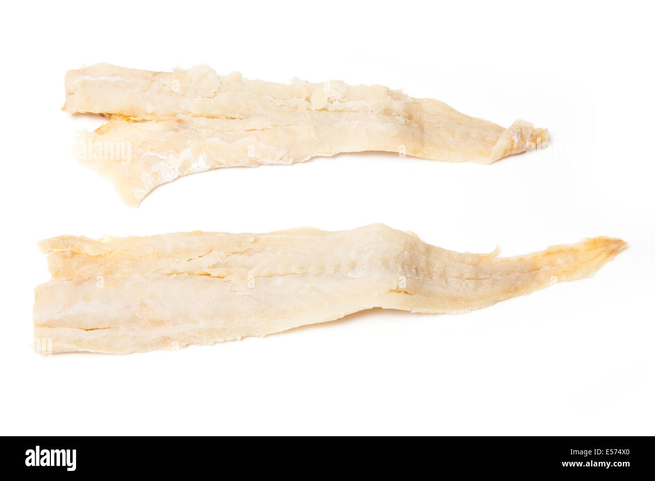 Pieces of salt cod fish isolated on a white studio background Stock ...