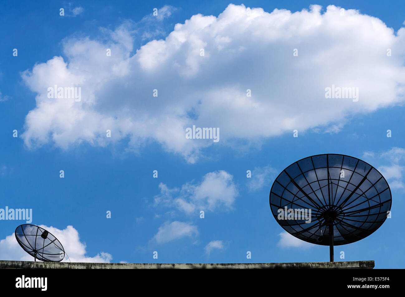 Satellite dish antenna on blue sky with cloud Stock Photo