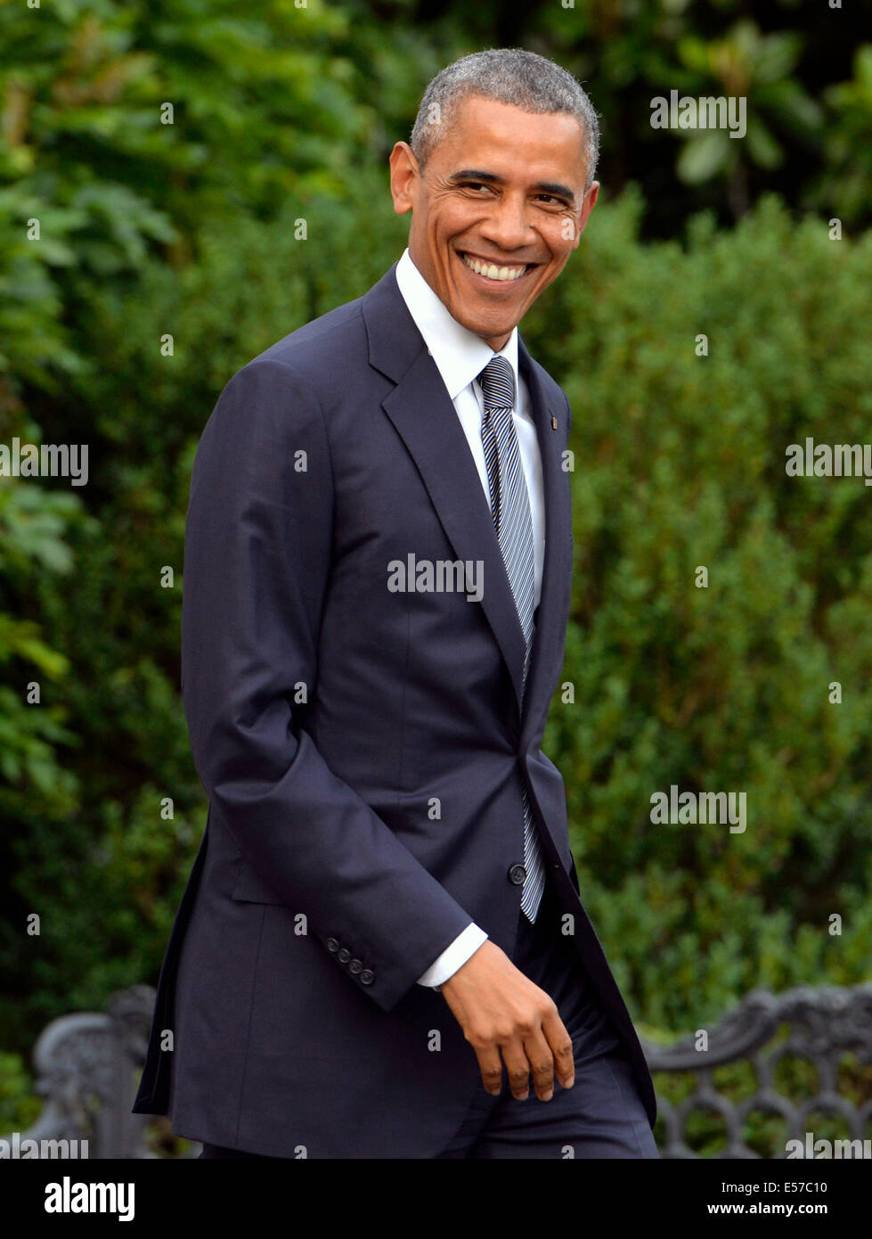 United States President Barack Obama departs the White House for a weekend trip to Camp David, the Presidential retreat near Thurmont, Maryland, Friday, July 18, 2014 in Washington, DC Credit: Kevin Dietsch/Pool via CNP Stock Photo