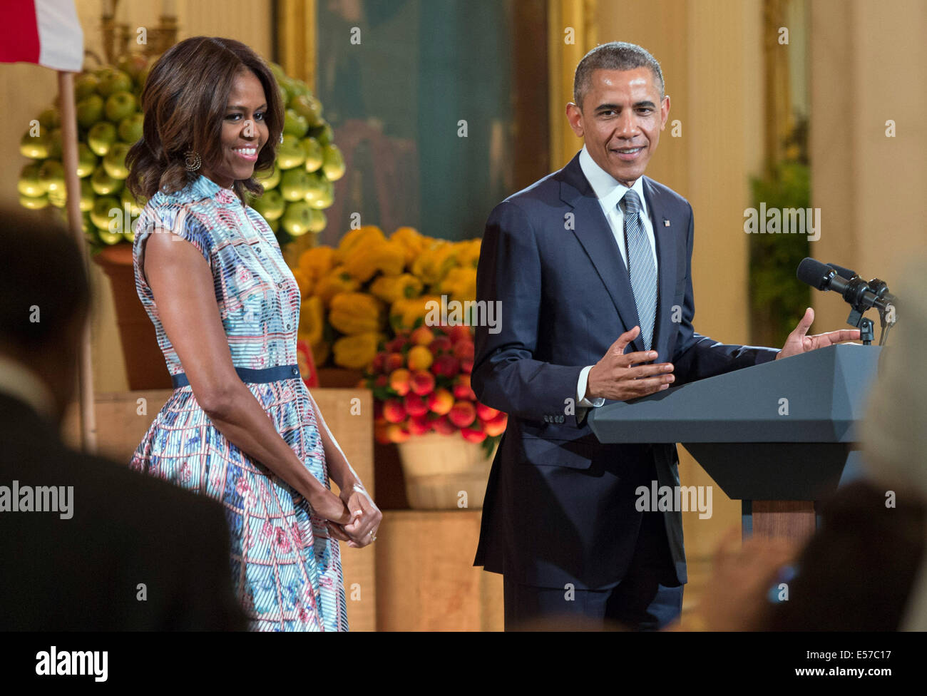 United States President Barack Obama and First Lady Michelle Obama deliver remarks at the Kids' State Dinner in the East Room at the White House on July 18, 2014 in Washington, DC Credit: Kevin Dietsch/Pool via CNP Stock Photo