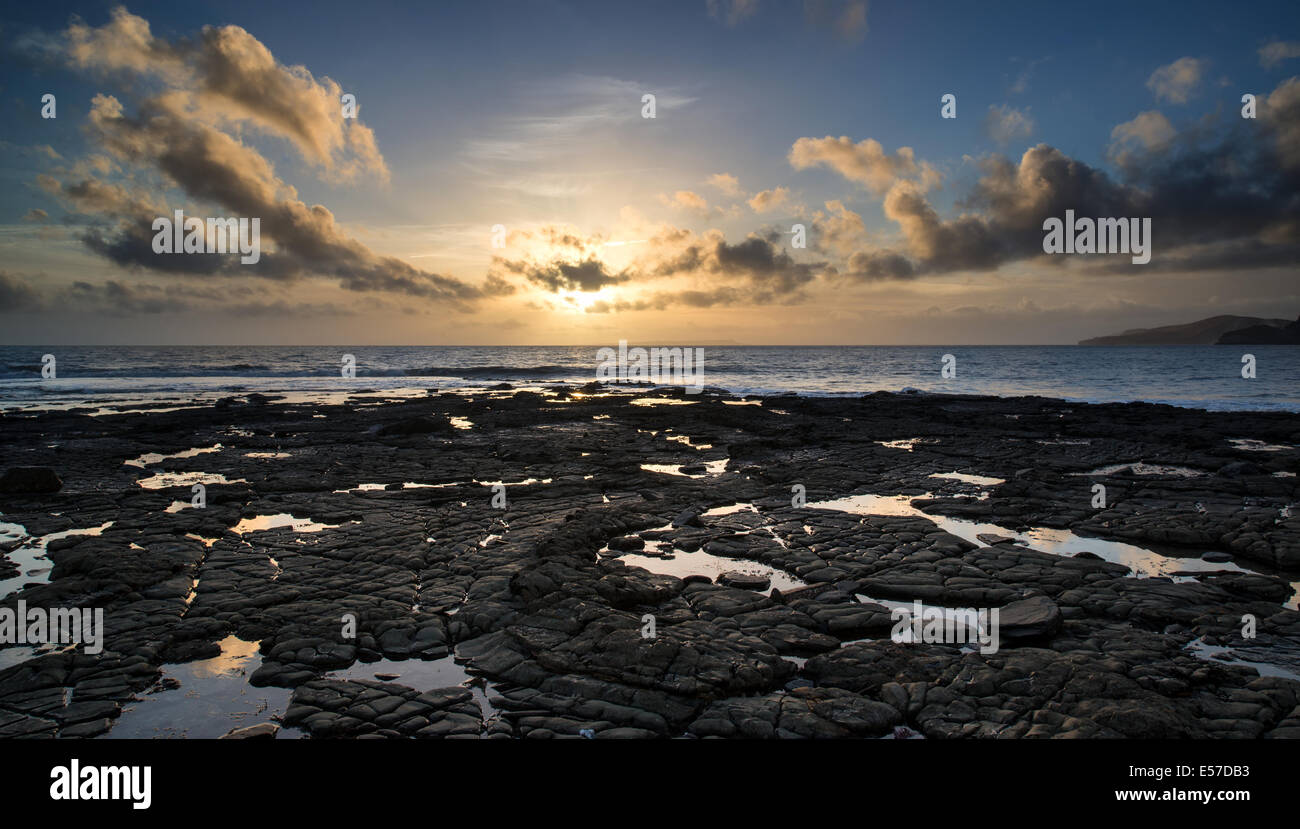 Stunning landscape ocean at sunset dramatic clouds Stock Photo - Alamy