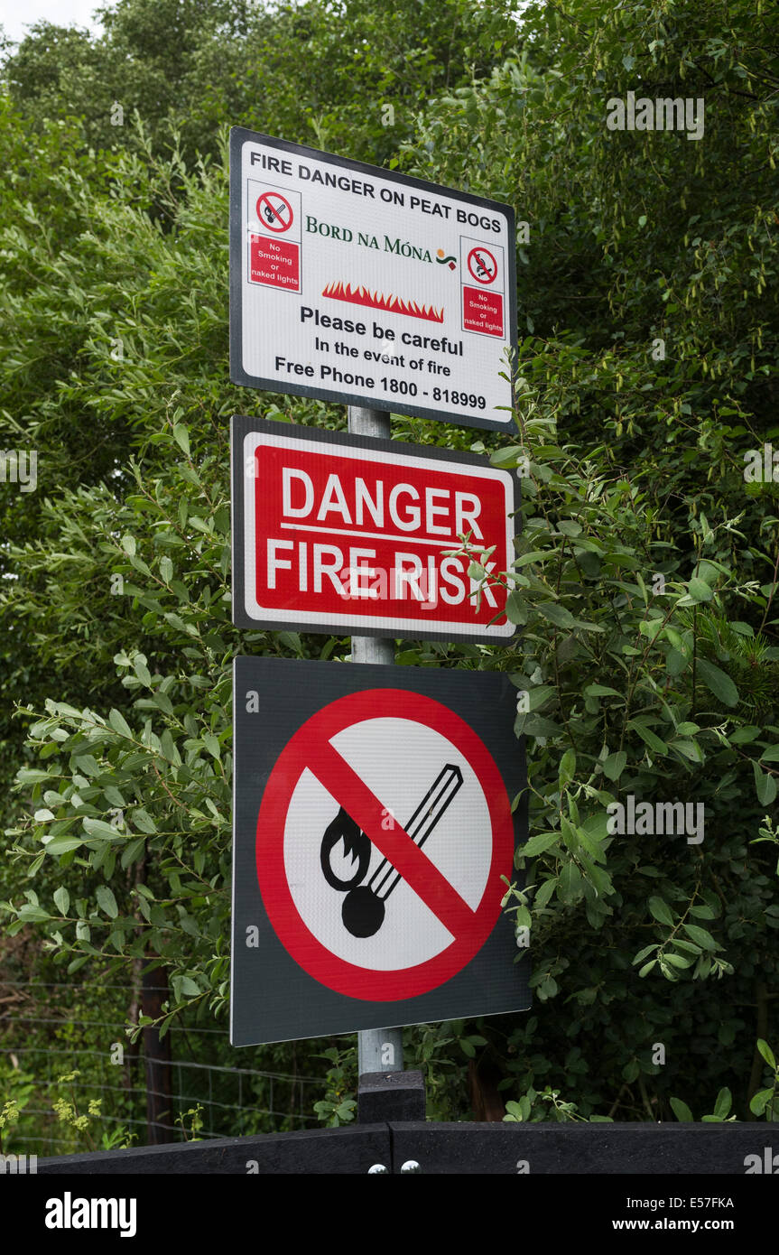 Signs warning of the danger of fire on the bog at Lullymore, Rathangan, Kildare, Ireland. Stock Photo