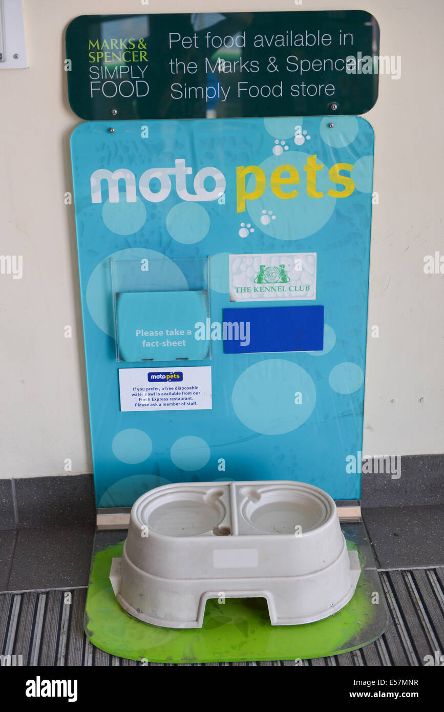 Moto pets dog bowls water Moto Toddington services Stock Photo