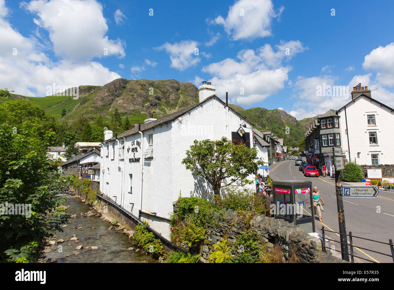 Coniston town the Lake District England with hot sunny summer weather and blue sky Stock Photo