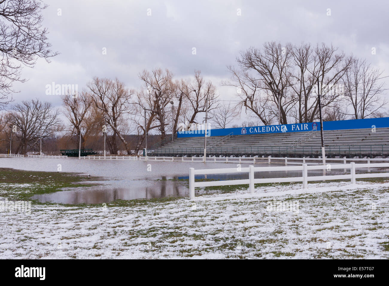 A field in the Caledonia Fairgrounds floods during a spring thaw. Caledonia, Ontario, Canada. Stock Photo