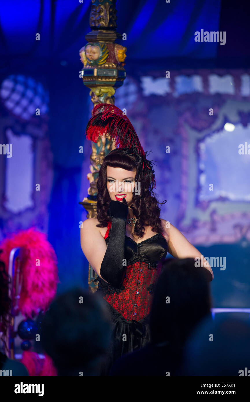 Burlesque artist Scarlett Belle performing a routine at Blysh Festival