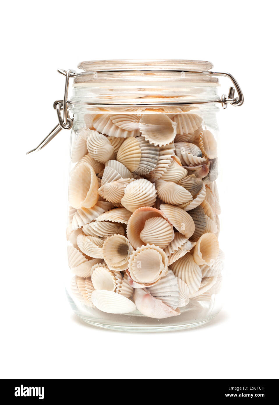 Seashells in glass bottle isolated Stock Photo - Alamy
