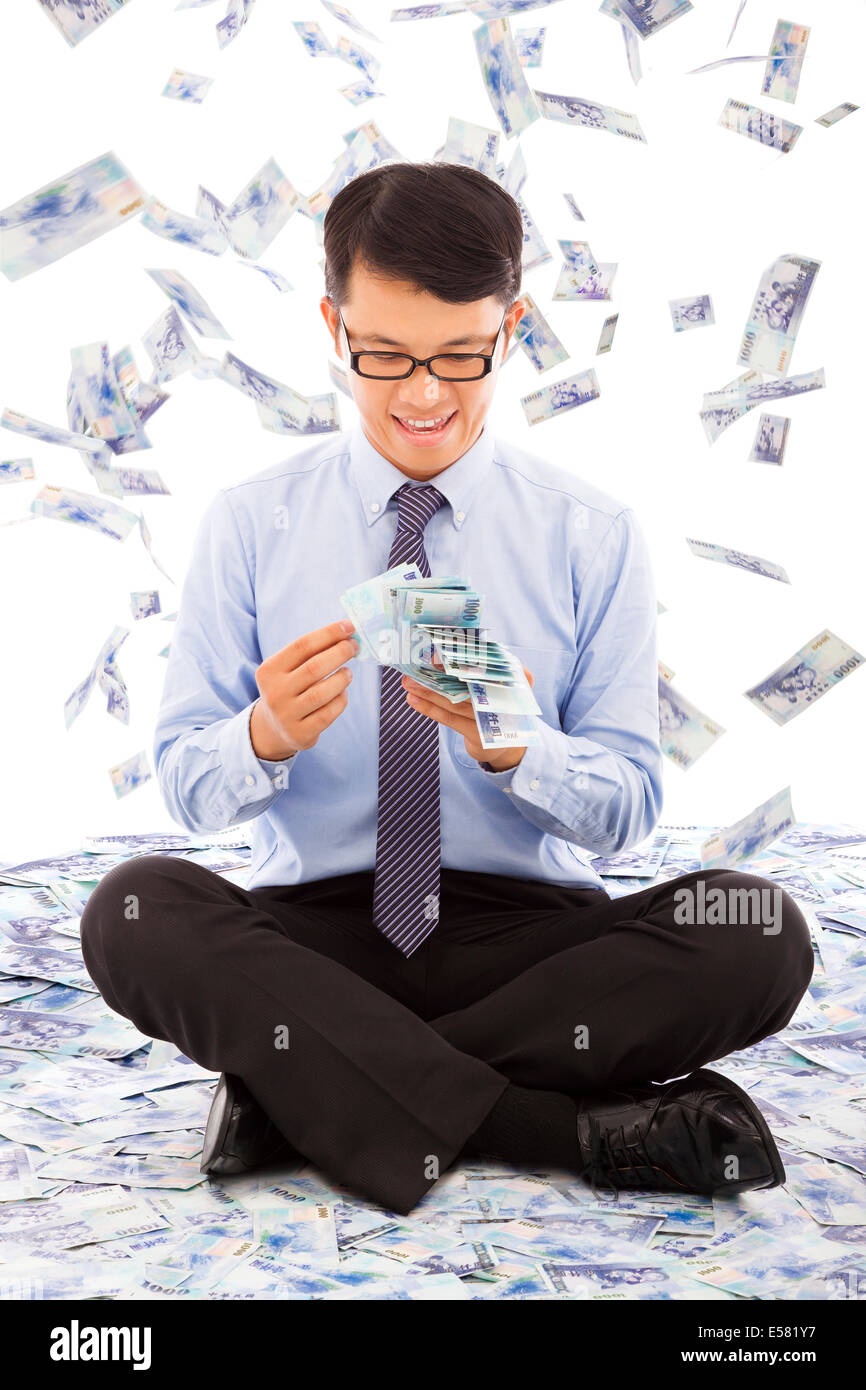 business man counting money with money rain background Stock Photo