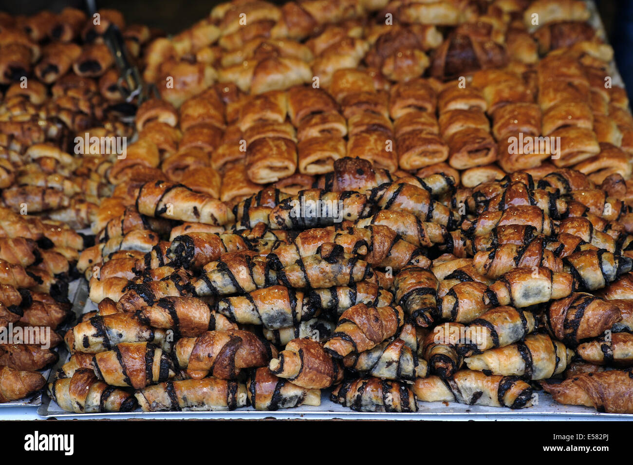Chocolate pastries on a stand for sale at Machane Yehuda market, Jerusalem, Israel Stock Photo