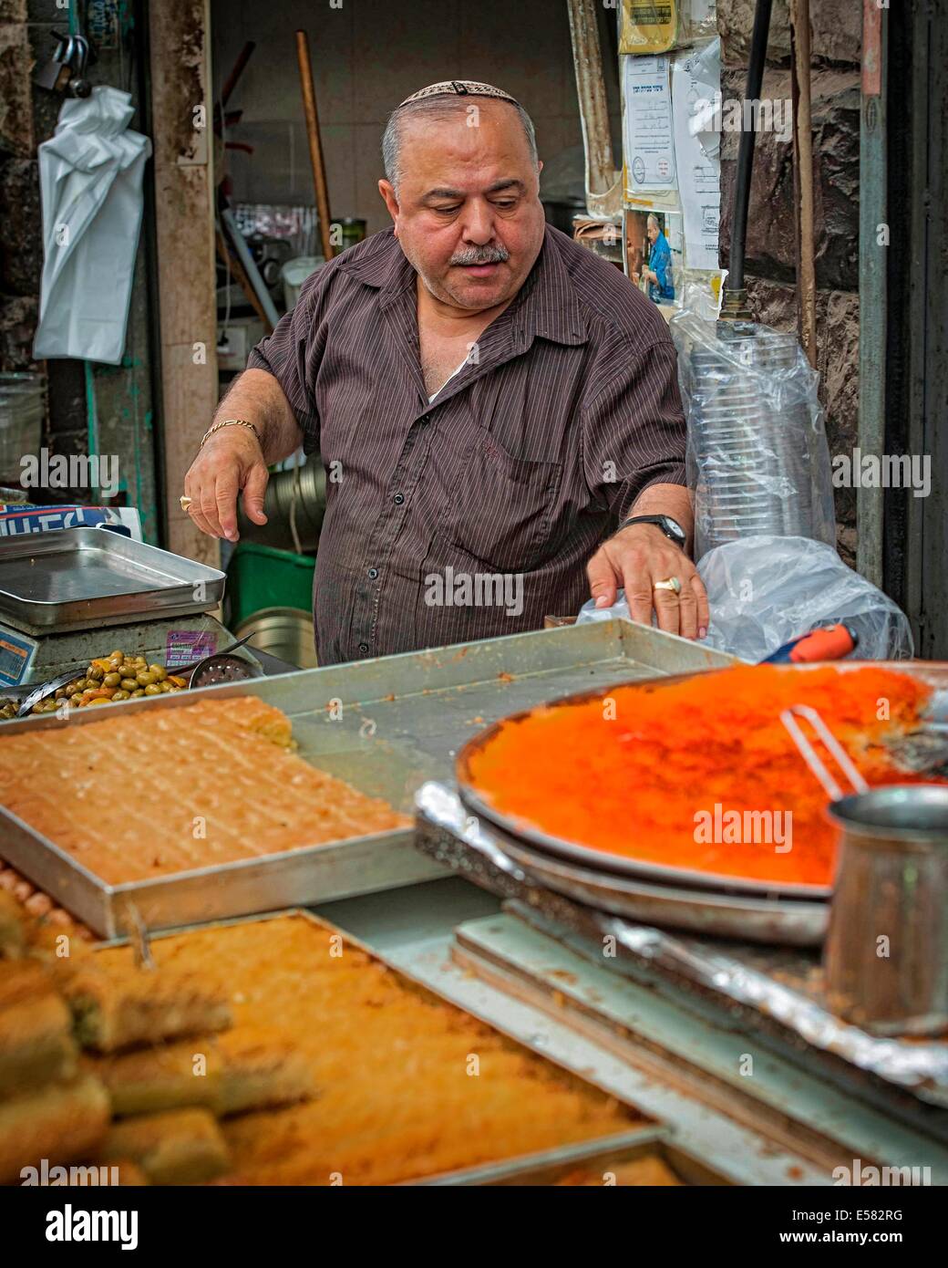 Cakes and pastries seller at Machane Yehuda market, Jerusalem, Israel Stock Photo