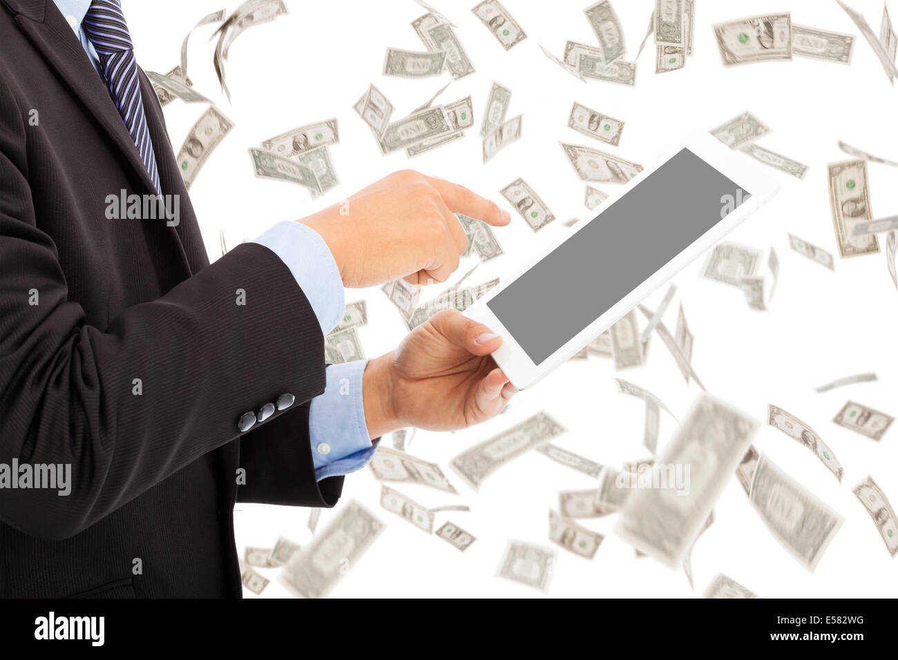 business man touching tablet with money rain background Stock Photo