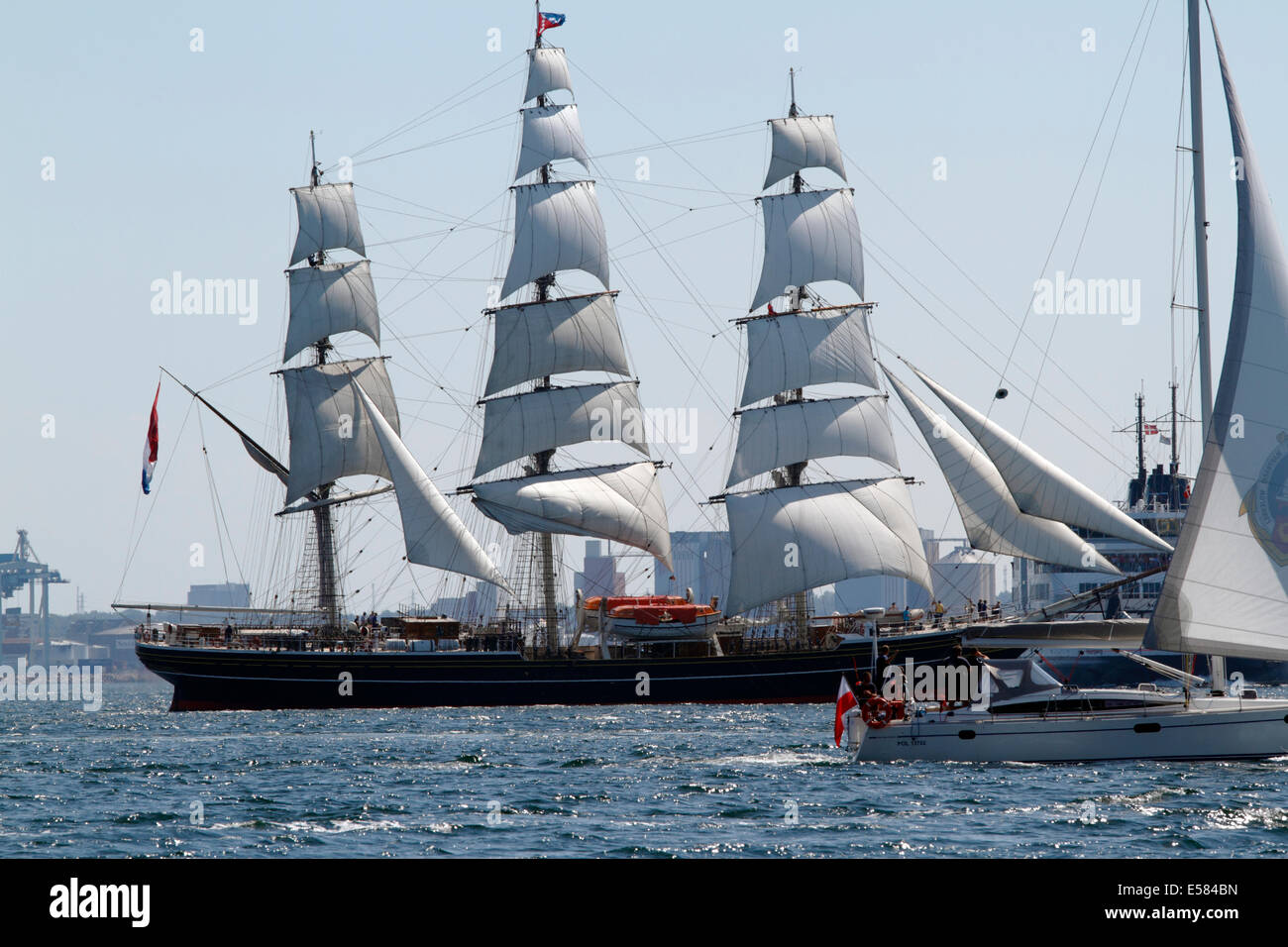 STAD AMSTERDAM, a Dutch three-masted clipper, passing Kronborg at Elsinore in the Sound, Øresund, between Denmark and Sweden. Stock Photo