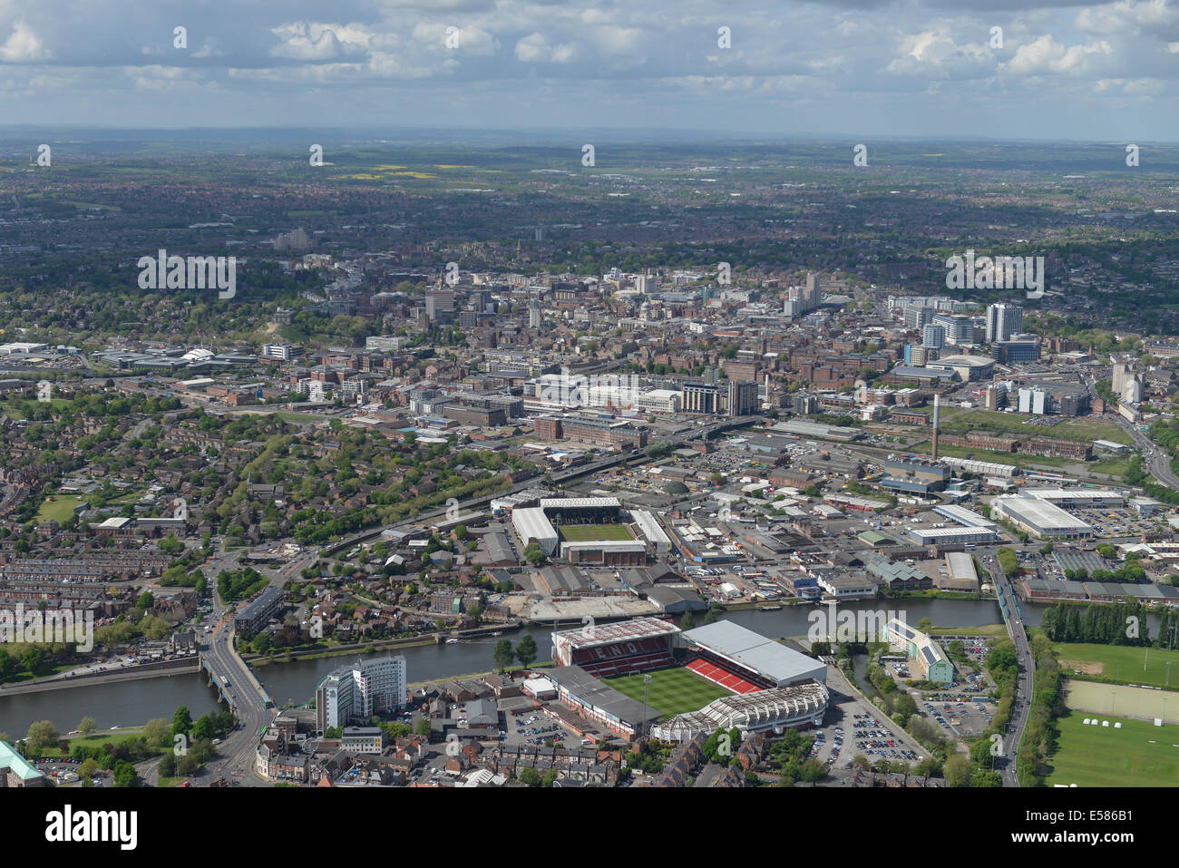 An aerial view looking from Trent Bridge, Nottingham. Both football grounds and the cricket ground visible, city centre behind. Stock Photo