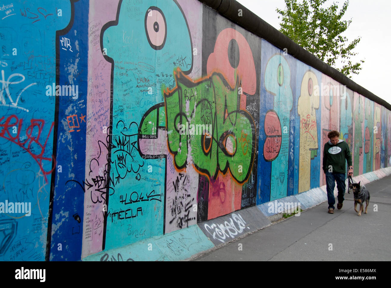 Pedestrian at East Side Gallery 'Berlin wall' Europe Germany Berlin Friedrichshain Stock Photo