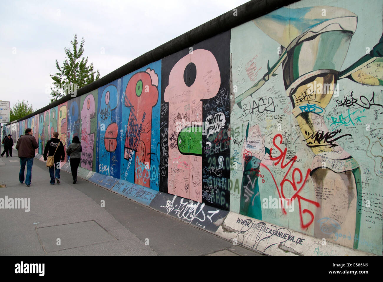 Tourists at East Side Gallery 'Berlin wall' Europe Germany Berlin Friedrichshain Stock Photo