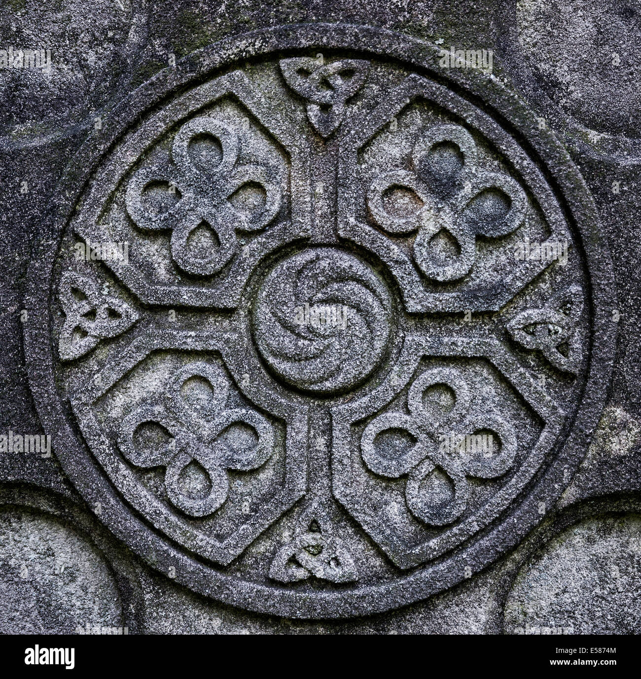 Celtic cross detail with knot symbol designs. Stock Photo