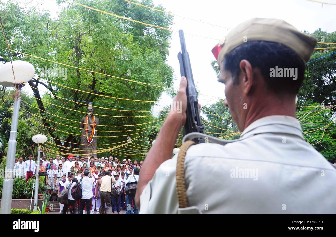 Allahabad India 23rd July 14 A Policeman Offers Gun Salute To Stock Photo Alamy