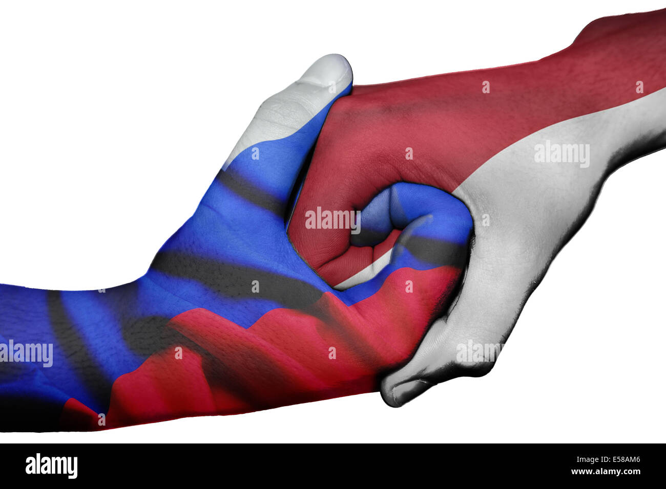 Diplomatic handshake between countries: flags of Russia and Indonesia overprinted the two hands Stock Photo