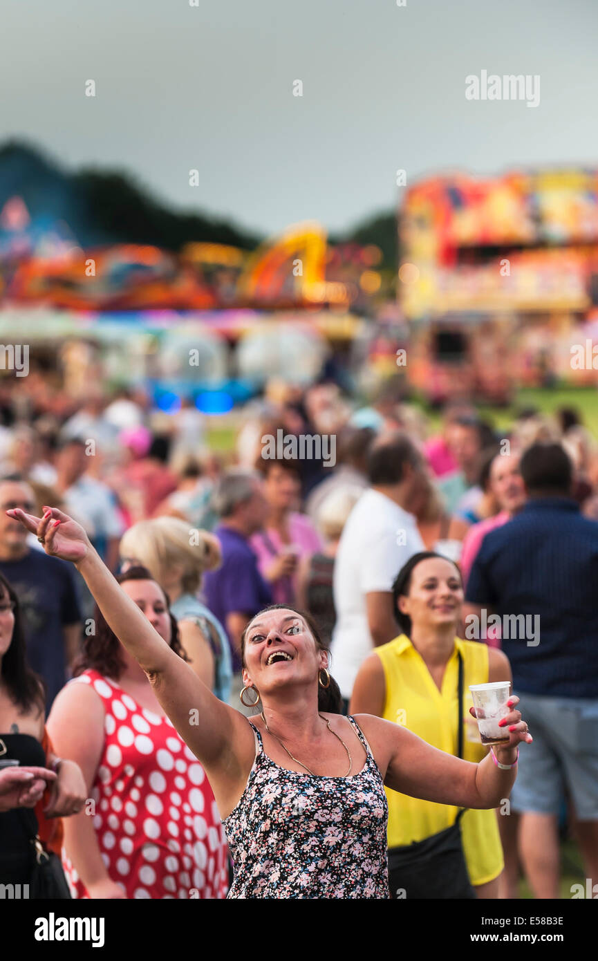 A festivalgoer enjoying herself at the Brentwood Festival. Stock Photo