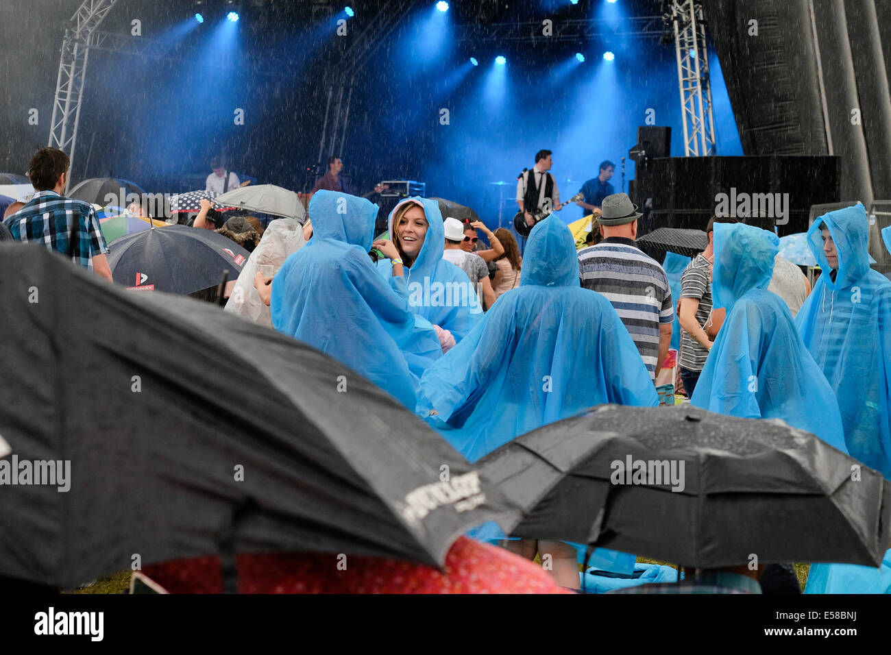 Festivalgoers enjoying the Brentwood Festival despite the bad weather. Stock Photo