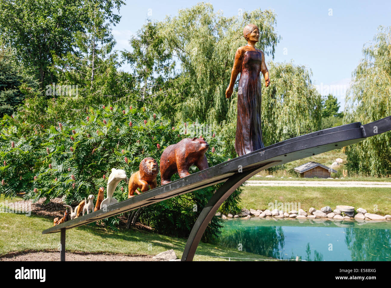 Canadian Chainsaw Art Carvings From Dead Trees As Backyard Decor
