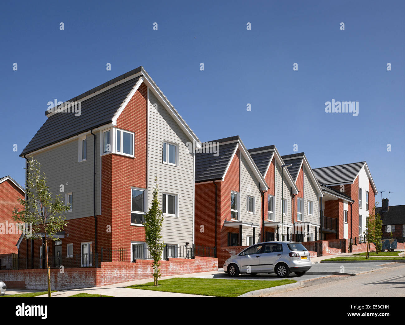 Car parked in driveway of new build housing estate, Wilmington Way