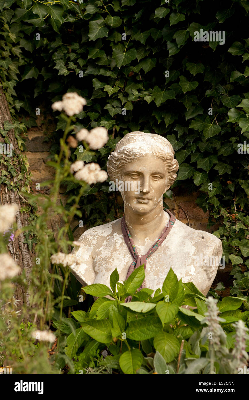 Garden bust in London home of writer Laetitia Maklouf, UK. Stock Photo