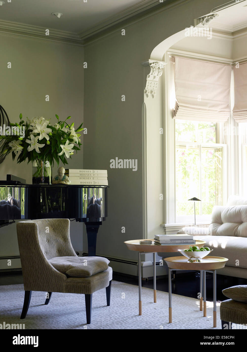 Grand piano and sunlit bay window in Jane Dillondesigned contemporary