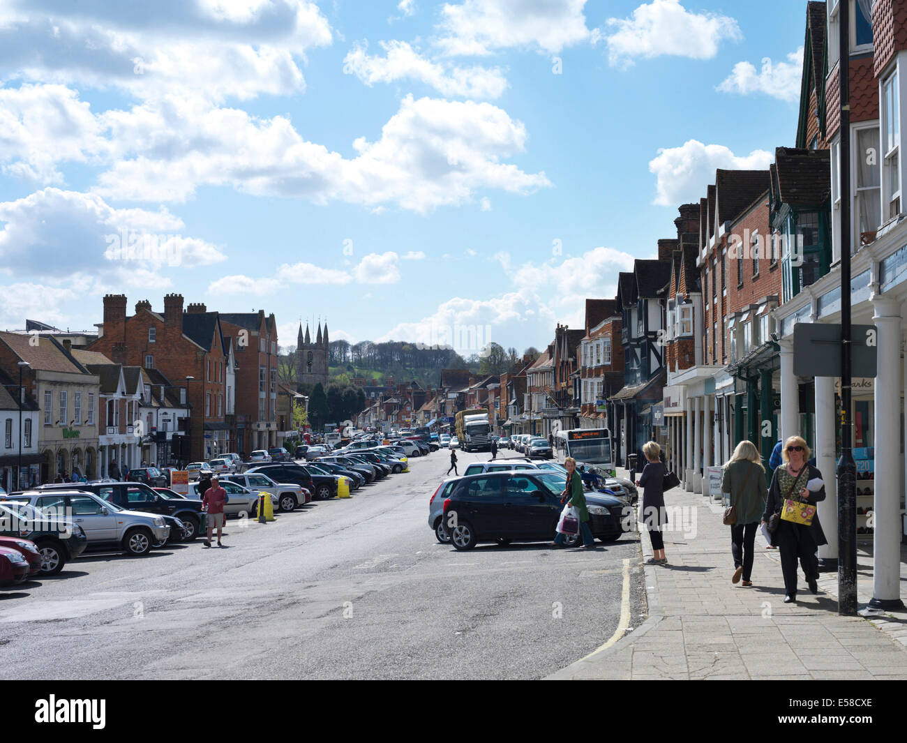 Cars parked in centre of street in Marlborough, Great Bedwyn, Savernake