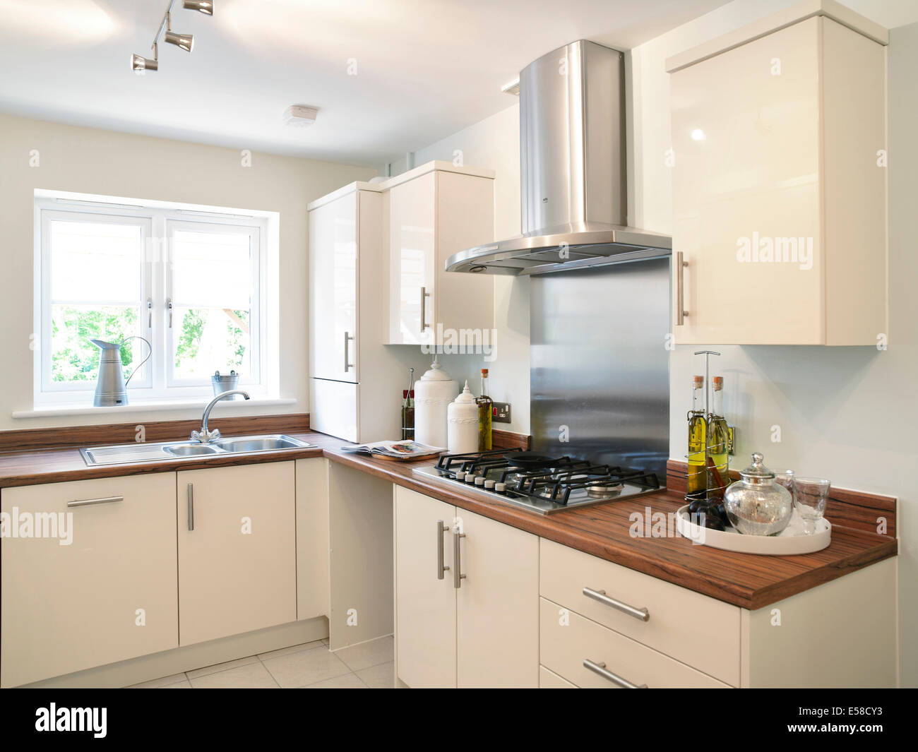 Fitted kitchen in new home in the Coppins, Corsham, Wiltshire, UK. Stock Photo