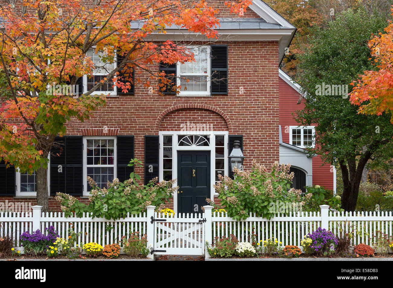 Charming New England brick house with picket fence, Grafton, Vermont, USA Stock Photo