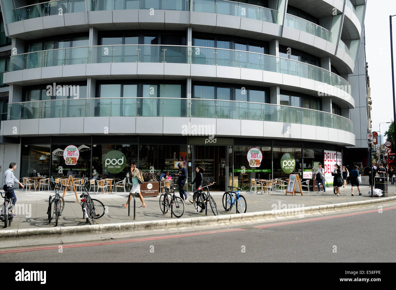 Pod Good Food with people passing and bike racks outside, Old Street, London England Britain UK Stock Photo