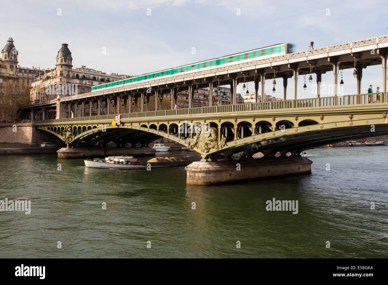 2014. Paris. Bir-Hakeim Bridge over the Seine with a ship and the metro Stock Photo