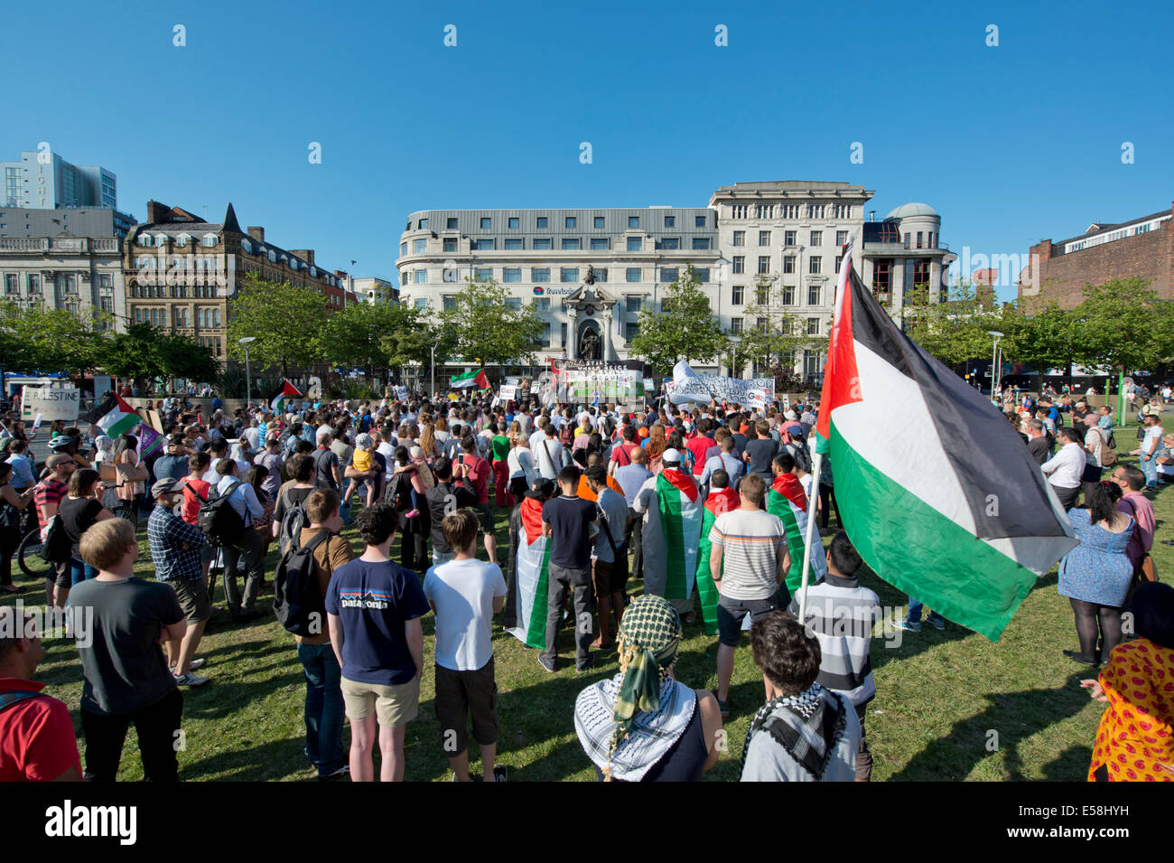 Manchester, UK. 23rd July, 2014. Hundreds of people attend a demonstration in the Piccadilly Gardens area of Manchester to protest over Israel's military actions in the Gaza Strip. Israel's actions have also been condemned by UN human rights official, Navi Pillay. Credit:  Russell Hart/Alamy Live News. Stock Photo