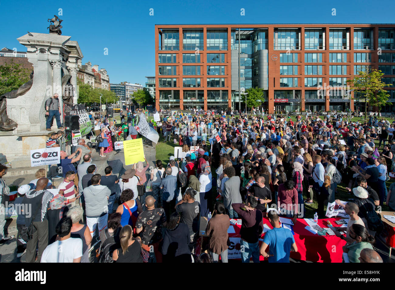 Manchester, UK. 23rd July, 2014. Hundreds of people attend a demonstration in the Piccadilly Gardens area of Manchester to protest over Israel's military actions in the Gaza Strip. Israel's actions have also been condemned by UN human rights official, Navi Pillay. Credit:  Russell Hart/Alamy Live News. Stock Photo
