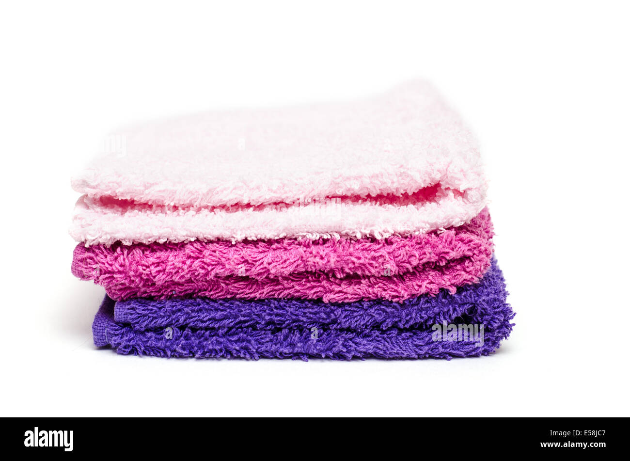 https://c8.alamy.com/comp/E58JC7/stack-of-different-colored-washcloth-of-terry-cloth-E58JC7.jpg