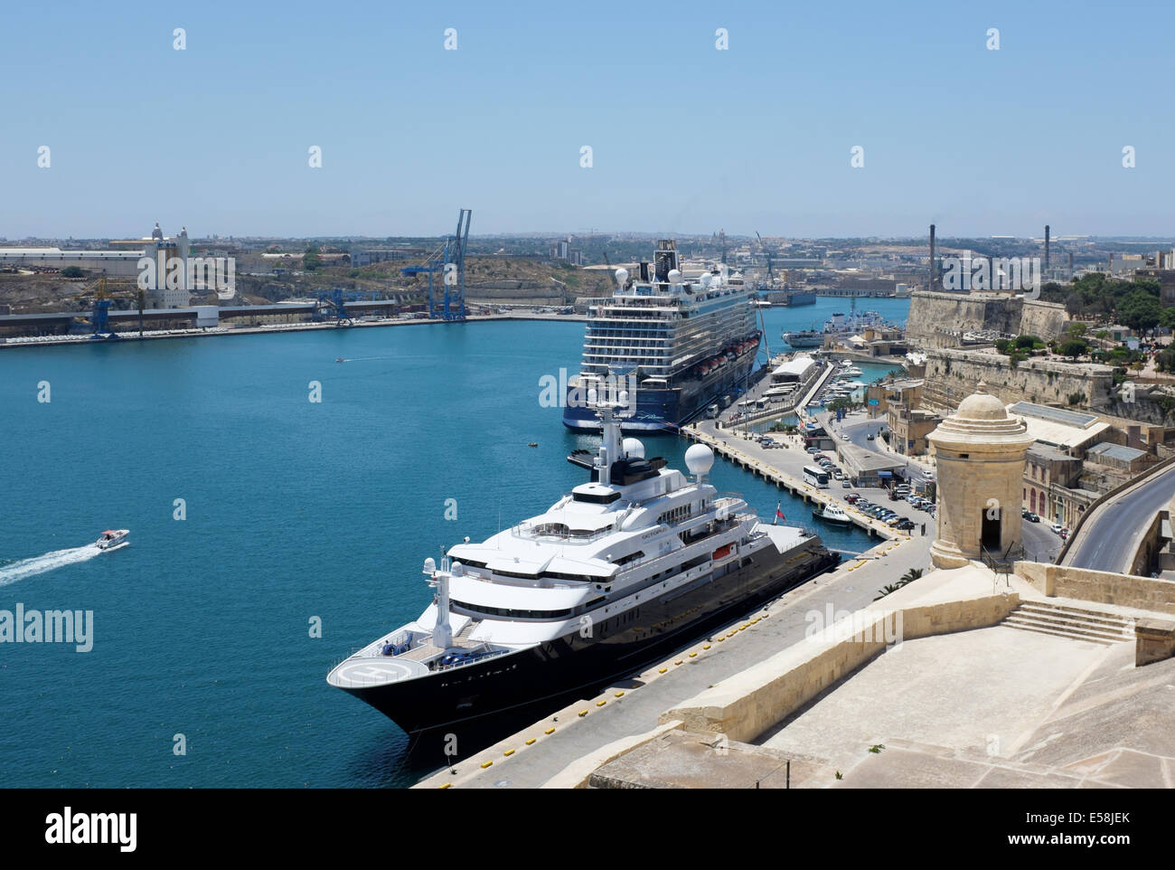 Octopus  Super Yacht owned by Microsofts Paul Allen moored in Valletta Grand Harbour Malta with Mein Schiff 3 in background Stock Photo